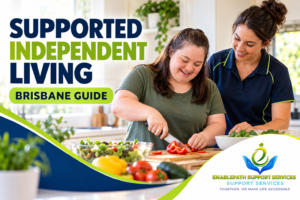 Participant preparing a meal at home with support from a worker, with EnablePath Support Services branding.